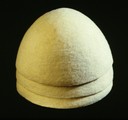 E 4: Object/ three white felt caps